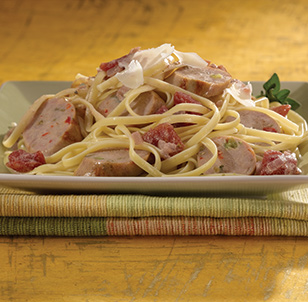 Grilled Italian Sausage Chicken Sausage with Tomato Cream Sauce over Linguine